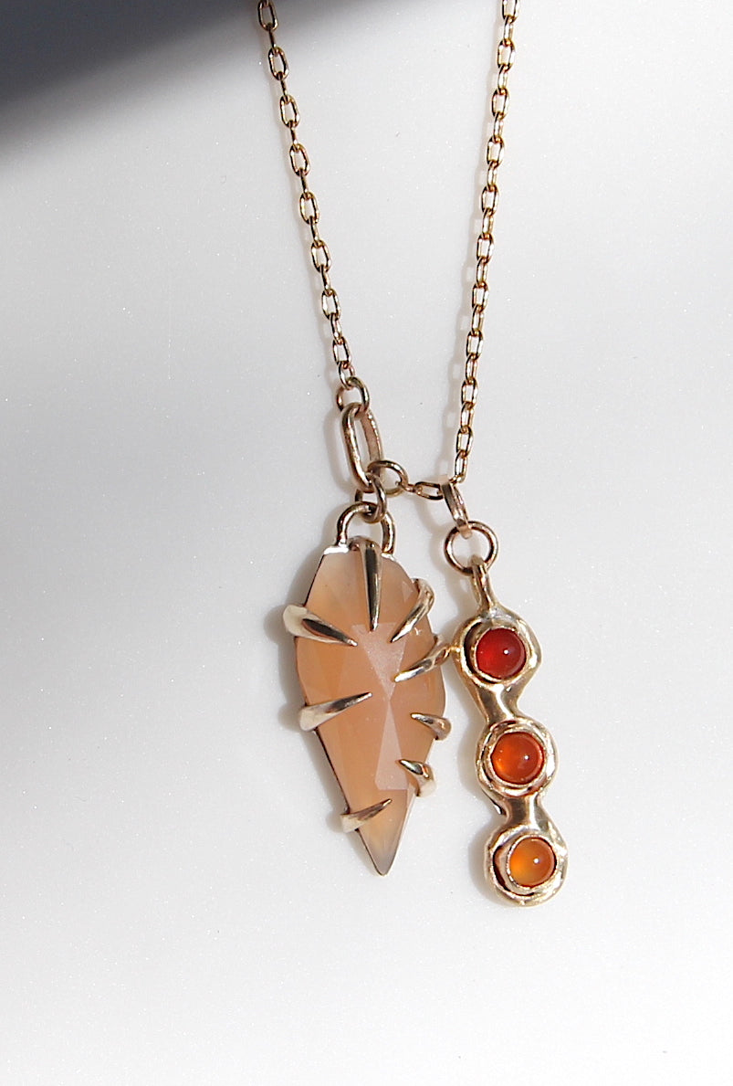 Peach Moonstone with triple carnelian charm
