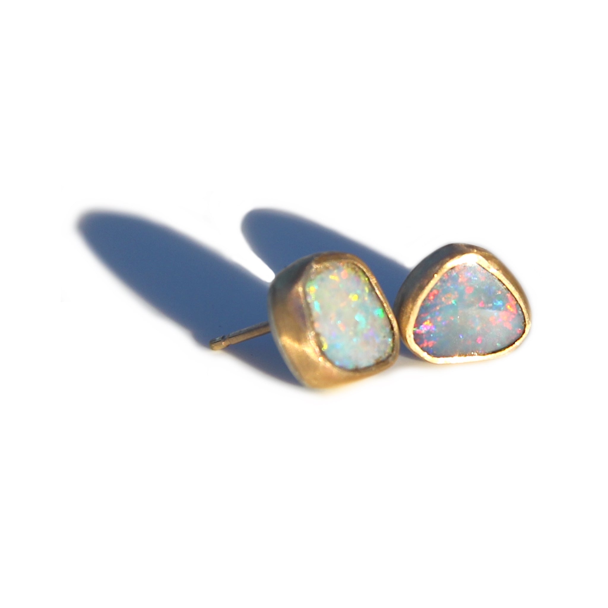 Asymmetrical Opal stud earrings in gold