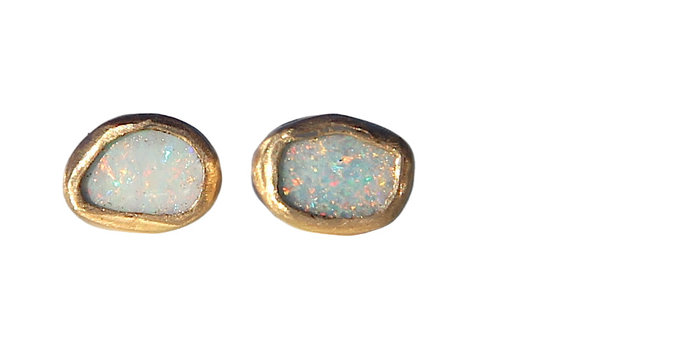 Asymmetrical oval opal studs in gold