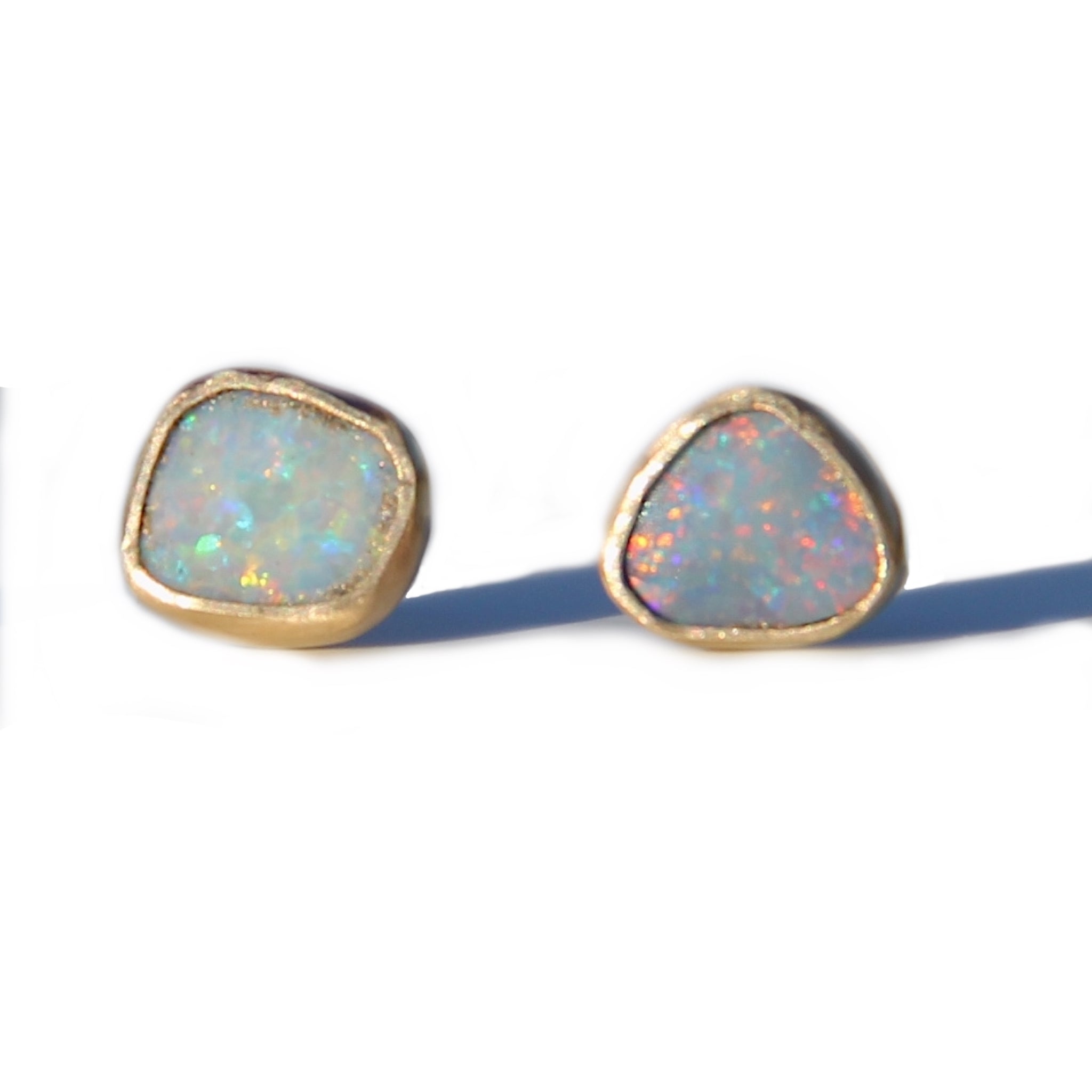 Asymmetrical Opal stud earrings in gold