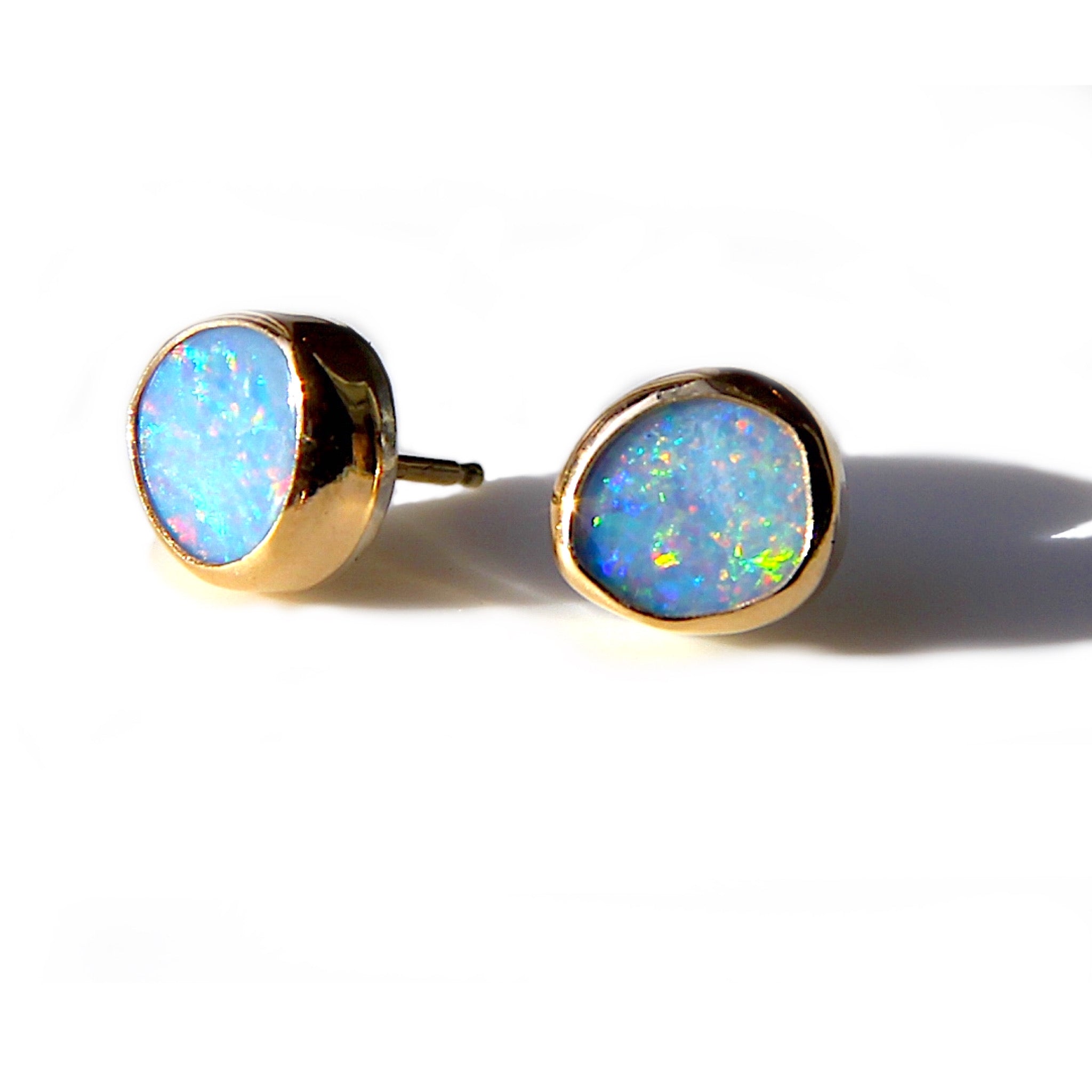 Opal studs in Gold