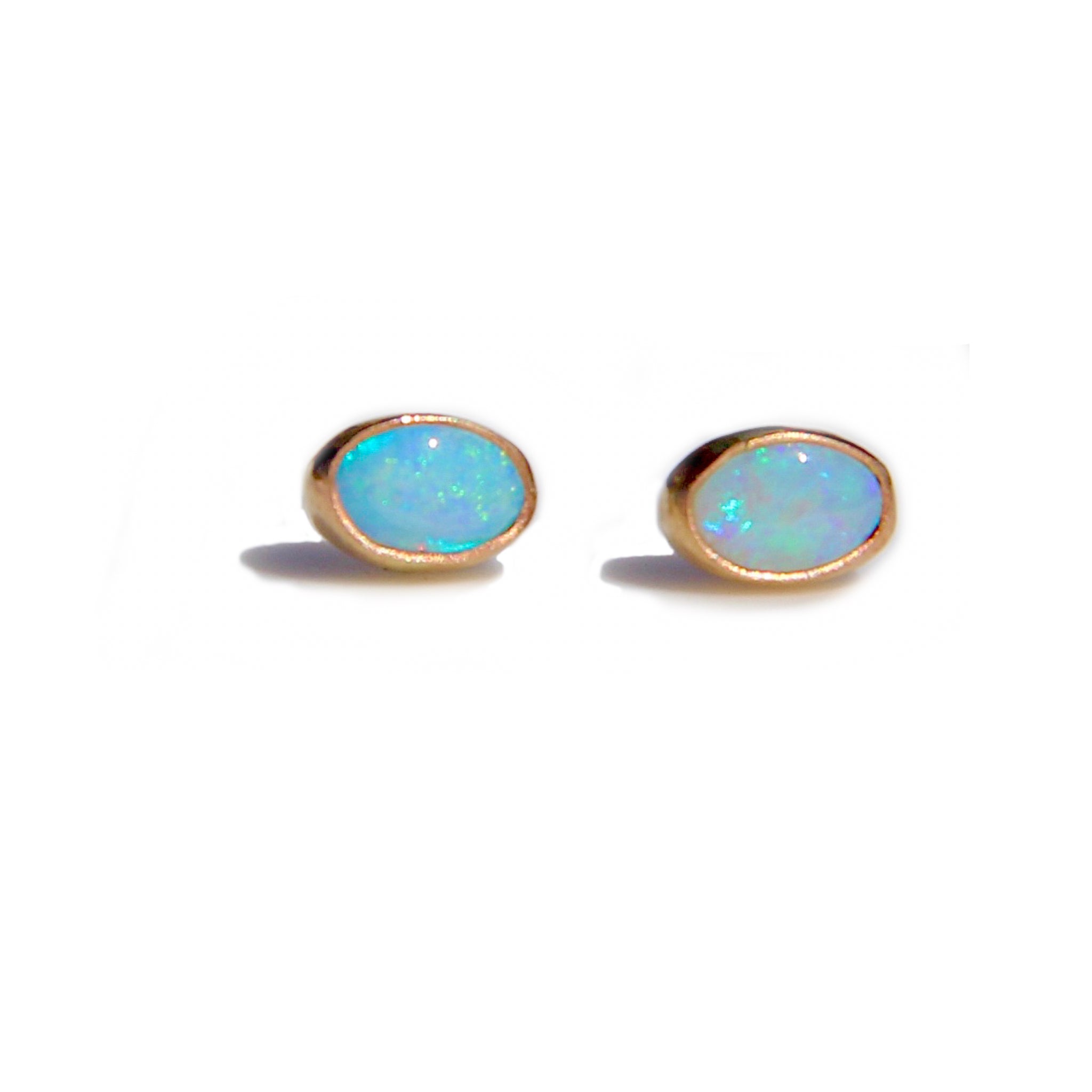 Oval opal stud earrings in gold